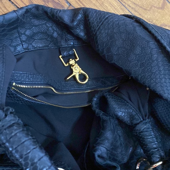 CC sky hobo black leather snakeskin zippers on the side with gold trim. - Picture 5 of 7